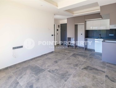 Новая солнечная квартира 55 м² в Махмутларе-id-8656-фото-2