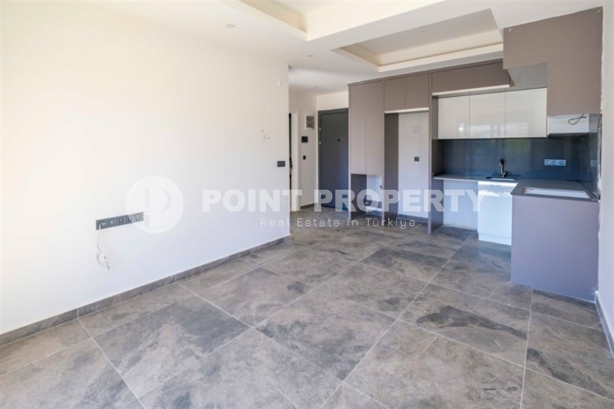 Новая солнечная квартира 55 м² в Махмутларе-id-8656-фото-2