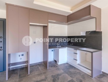 Новая солнечная квартира 55 м² в Махмутларе-id-8656-фото-4