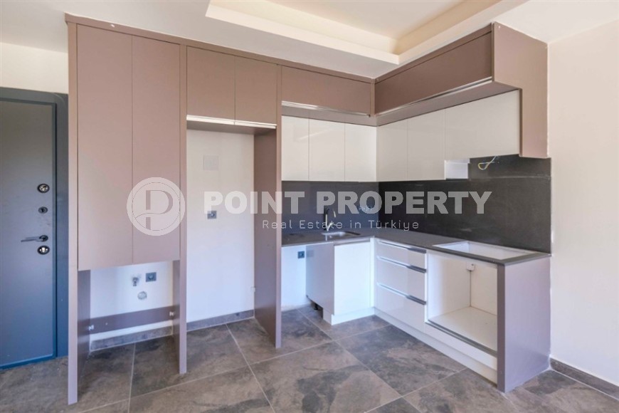 Новая солнечная квартира 55 м² в Махмутларе-id-8656-фото-4