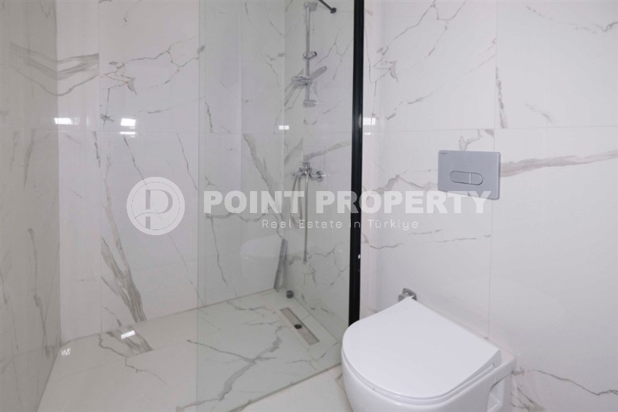 Новая солнечная квартира 55 м² в Махмутларе-id-8656-фото-8