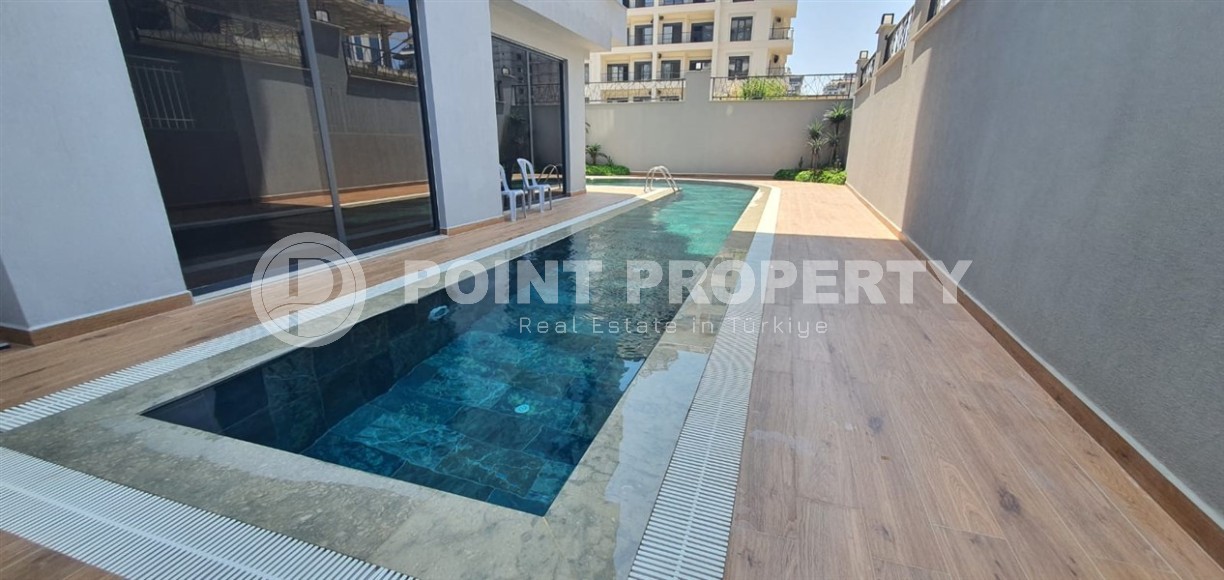 Новая солнечная квартира 55 м² в Махмутларе-id-8656-фото-14