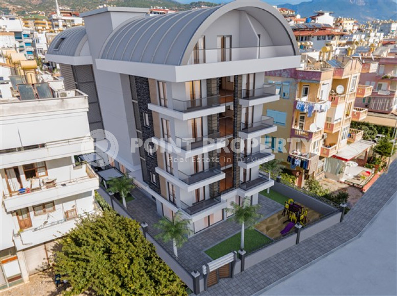 Двухкомнатная квартира, 50м², в комплексе на этапе строительства в центре Алании, 150м от пляжа Кейкубат-id-1676-фото-17