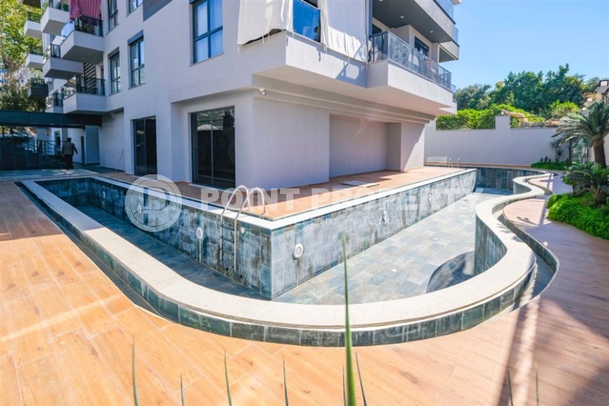 Новая солнечная квартира 55 м² в Махмутларе-id-8656-фото-15