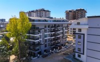 Новая солнечная квартира 55 м² в Махмутларе-id-8656-фото-16