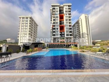 Furnished apartment 55 m² in a popular complex in Mahmutlar-id-8657-photo-1