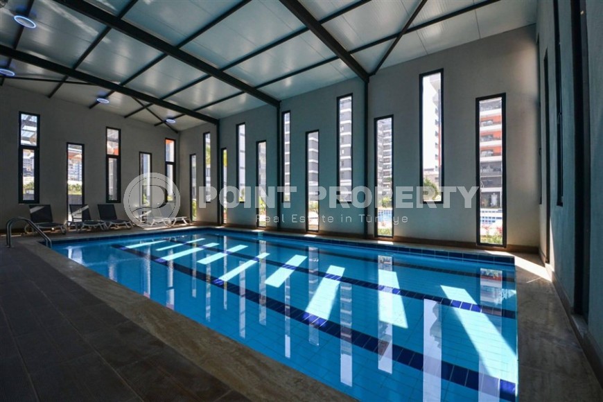 Furnished apartment 55 m² in a popular complex in Mahmutlar-id-8657-photo-12