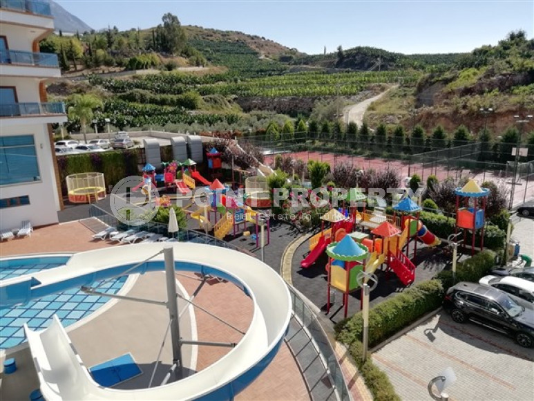 Large apartment 1+1, 65m², in an elite residence at the foot of the Taurus Mountains in Mahmutlar, Alanya-id-1678-photo-8