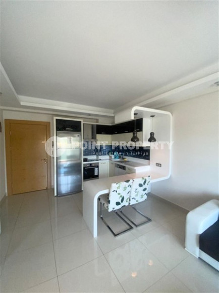 Large apartment 1+1, 65m², in an elite residence at the foot of the Taurus Mountains in Mahmutlar, Alanya-id-1678-photo-15