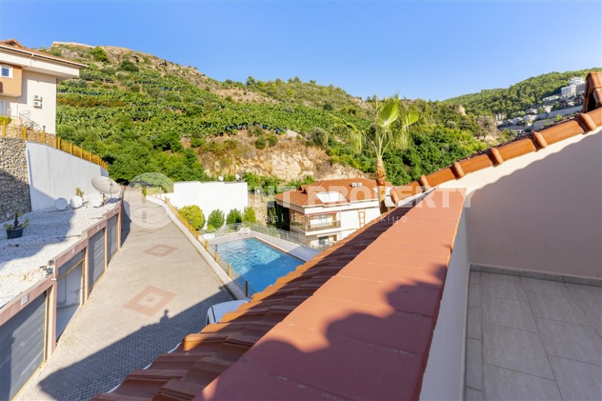 Двухуровневая квартира с красивым видом на море и горы в районе Каргыджак-id-8694-фото-14