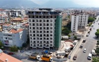 An elite complex at the excavation stage in the center of Alanya, within easy reach of the beach and the historical port.-id-1021-photo-14