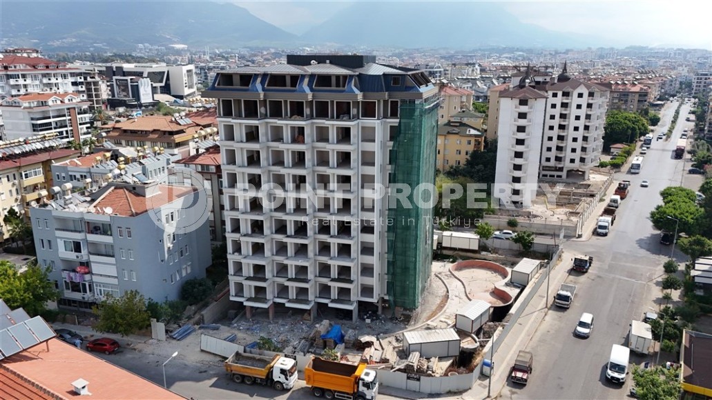 An elite complex at the excavation stage in the center of Alanya, within easy reach of the beach and the historical port.-id-1021-photo-14