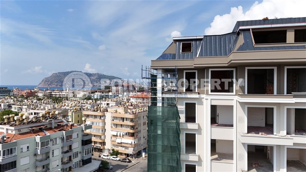 An elite complex at the excavation stage in the center of Alanya, within easy reach of the beach and the historical port.-id-1021-photo-15