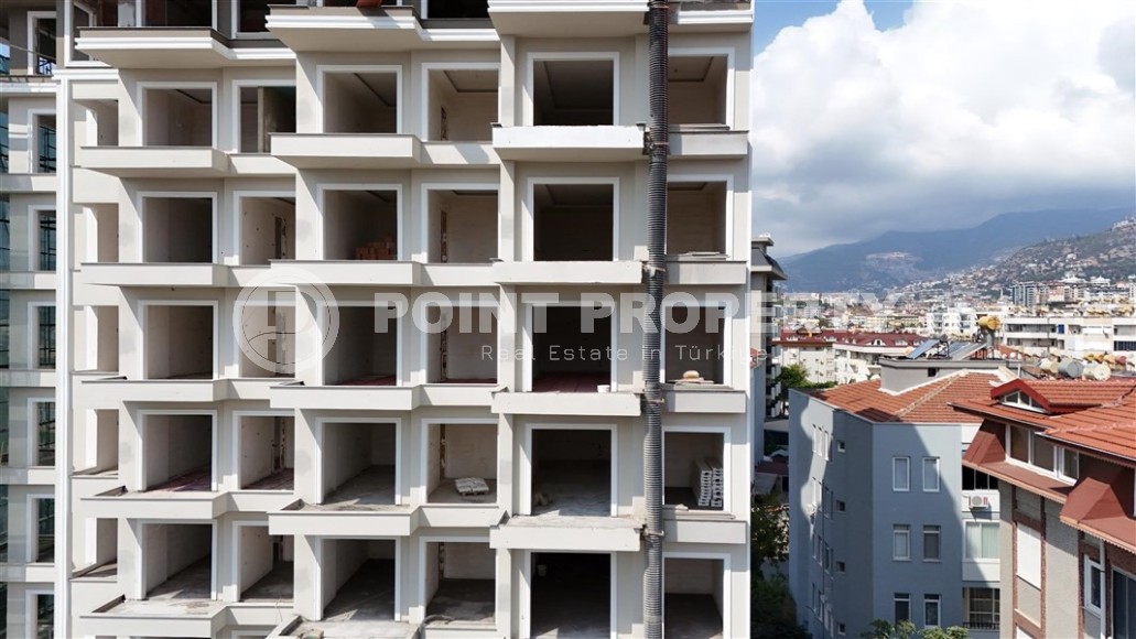 An elite complex at the excavation stage in the center of Alanya, within easy reach of the beach and the historical port.-id-1021-photo-16