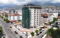 An elite complex at the excavation stage in the center of Alanya, within easy reach of the beach and the historical port.-id-1021-photo-18