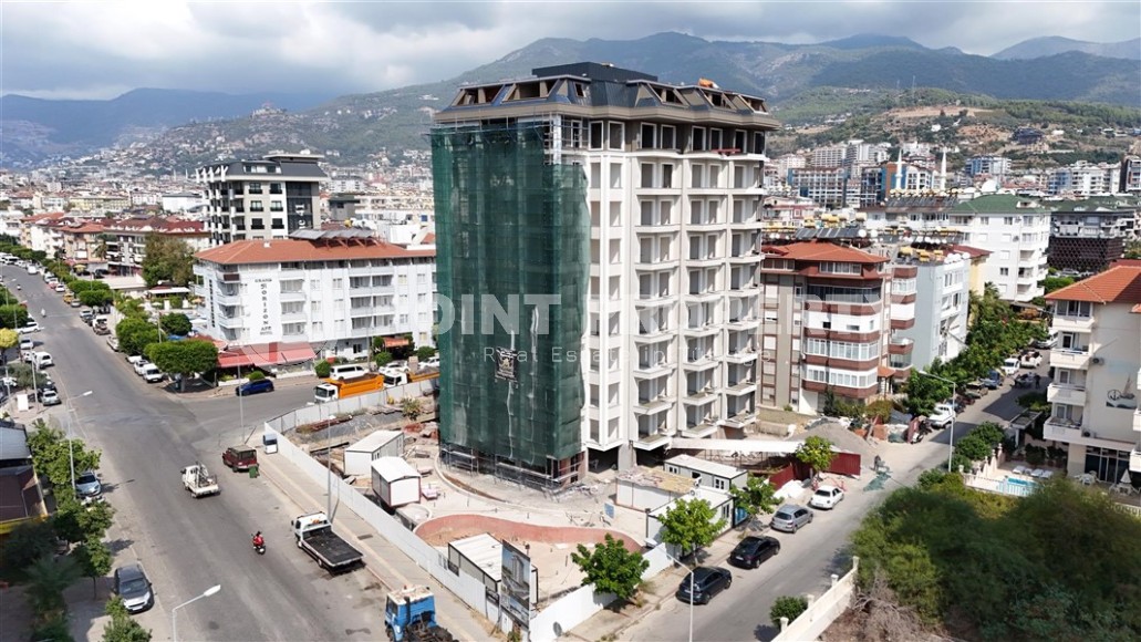 An elite complex at the excavation stage in the center of Alanya, within easy reach of the beach and the historical port.-id-1021-photo-18
