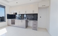 Новый стильный инвестиционный проект на этапе строительства от надёжного застройщика Алании. Широкая инфраструктура, различные планировки. От 55 м2.-id-1100-фото-23