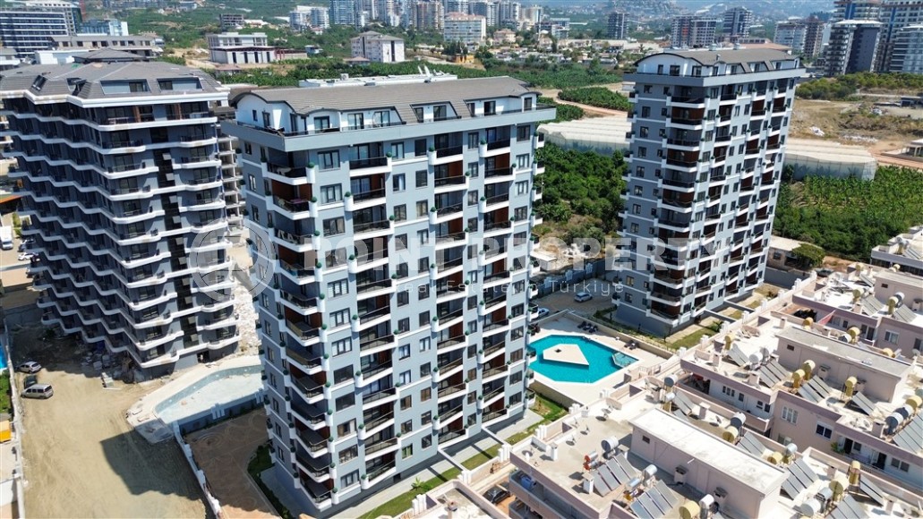 A new stylish investment project under construction from a reliable developer in Alanya. Wide infrastructure, various layouts. From 55 m2.-id-1100-photo-33
