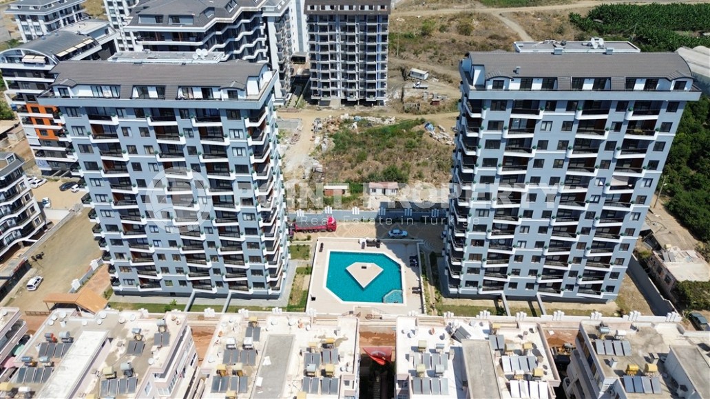 A new stylish investment project under construction from a reliable developer in Alanya. Wide infrastructure, various layouts. From 55 m2.-id-1100-photo-34