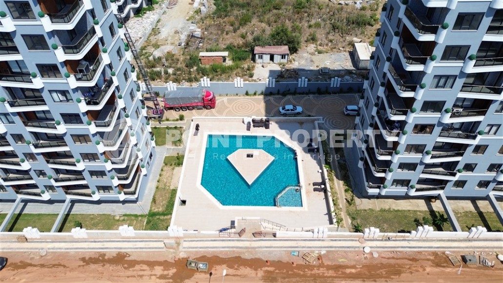 A new stylish investment project under construction from a reliable developer in Alanya. Wide infrastructure, various layouts. From 55 m2.-id-1100-photo-35