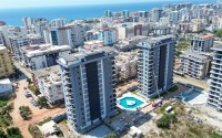Новый стильный инвестиционный проект на этапе строительства от надёжного застройщика Алании. Широкая инфраструктура, различные планировки. От 55 м2.-id-1100-фото-36