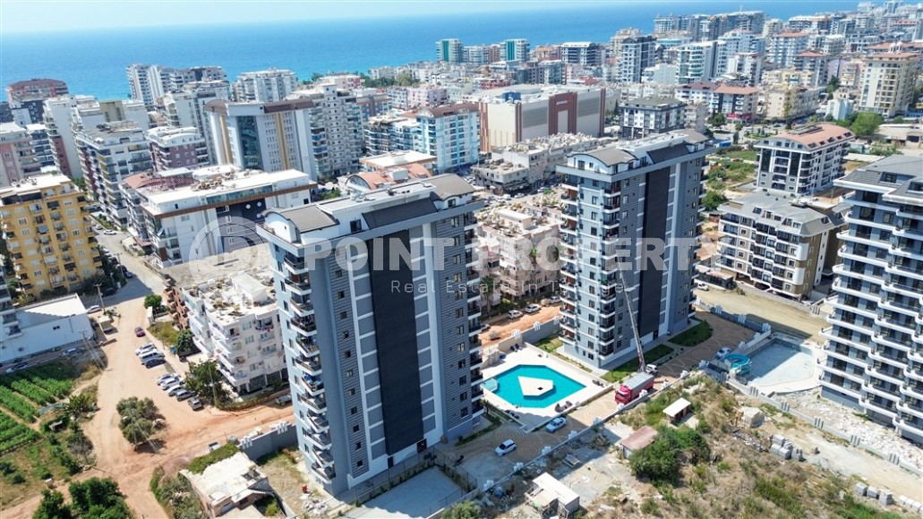 A new stylish investment project under construction from a reliable developer in Alanya. Wide infrastructure, various layouts. From 55 m2.-id-1100-photo-36