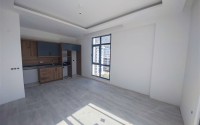 Современная квартира 55 м² в новом комплексе Махмутлара-id-8701-фото-2
