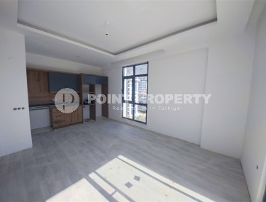 Современная квартира 55 м² в новом комплексе Махмутлара-id-8701-фото-2