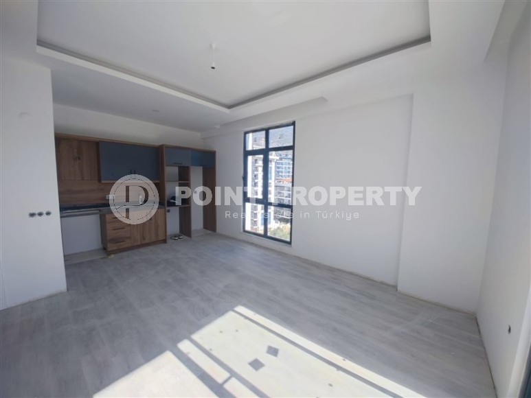 Современная квартира 55 м² в новом комплексе Махмутлара-id-8701-фото-2