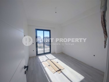 Современная квартира 55 м² в новом комплексе Махмутлара-id-8701-фото-3