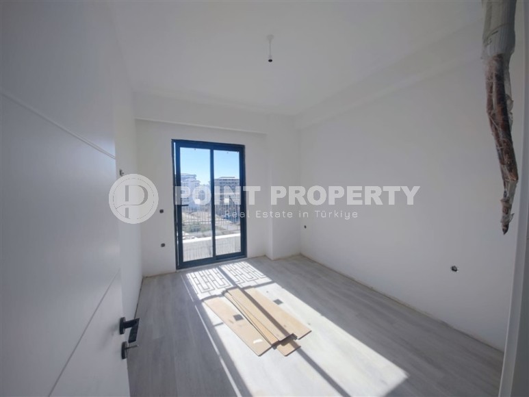 Современная квартира 55 м² в новом комплексе Махмутлара-id-8701-фото-3