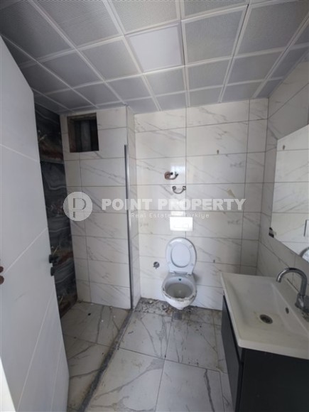 Современная квартира 55 м² в новом комплексе Махмутлара-id-8701-фото-5