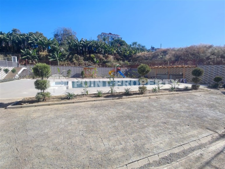 Современная квартира 55 м² в новом комплексе Махмутлара-id-8701-фото-7