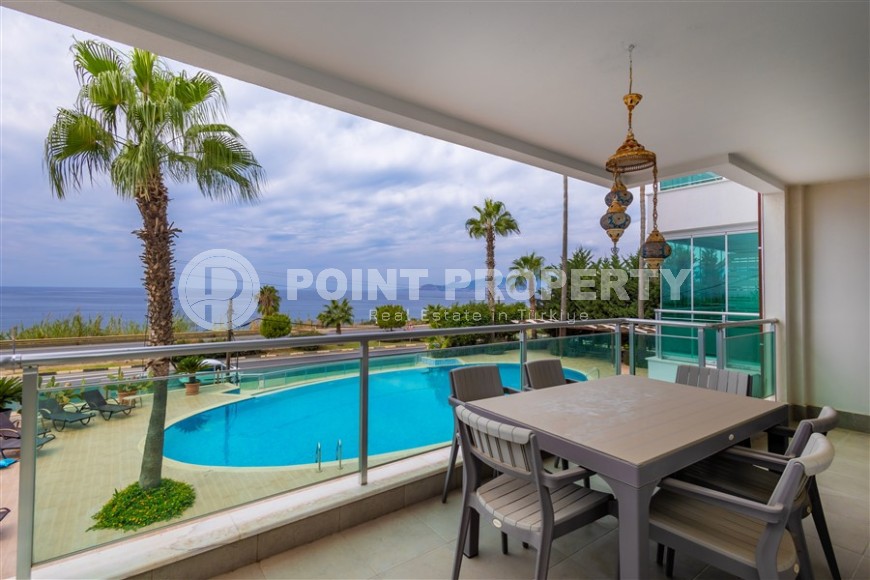 Furnished apartment 110 m² on the beach with panoramic sea view in Kargicak-id-8705-photo-1
