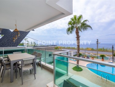 Furnished apartment 110 m² on the beach with panoramic sea view in Kargicak-id-8705-photo-2