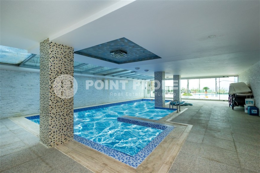 Furnished apartment 110 m² on the beach with panoramic sea view in Kargicak-id-8705-photo-11