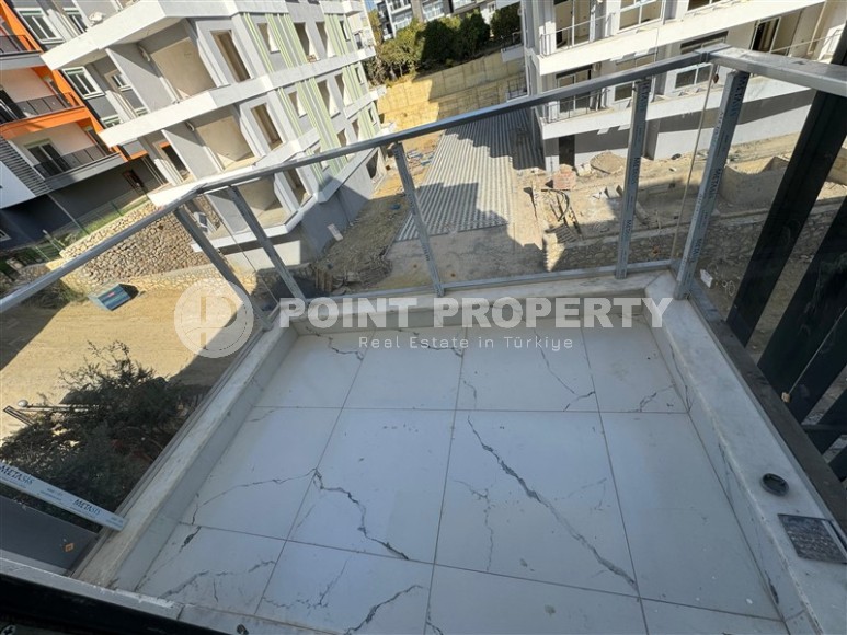 Квартиры в современном жилом комплексе на завершающем этапе строительства, в спокойном районе Аланьи - Авсаллар-id-6053-фото-8