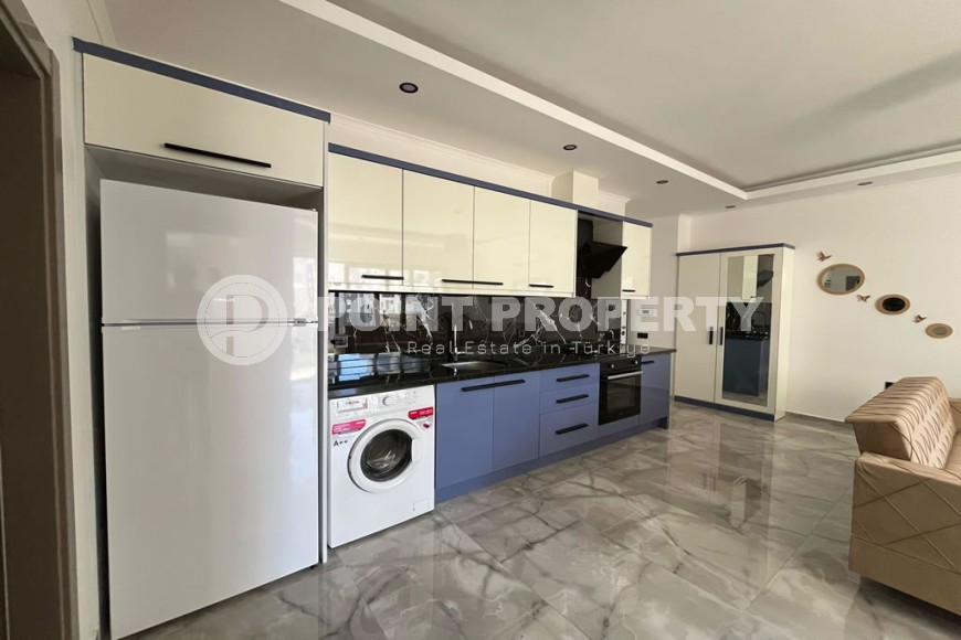 Стильная квартира 60 м² с мебелью в Махмутларе-id-8711-фото-4