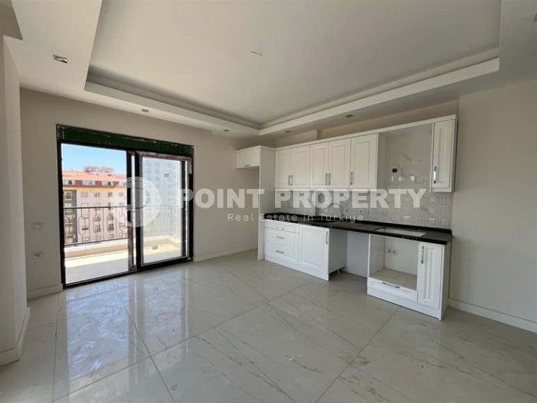 Современная квартира 55 м² в Махмутларе в комплексе с богатой инфраструктурой-id-8715-фото-2