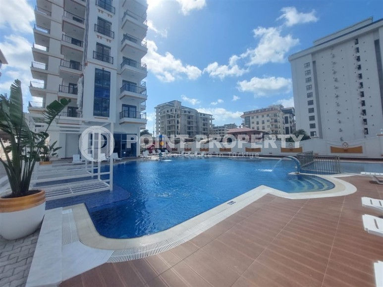 Современная квартира 55 м² в Махмутларе в комплексе с богатой инфраструктурой-id-8715-фото-24