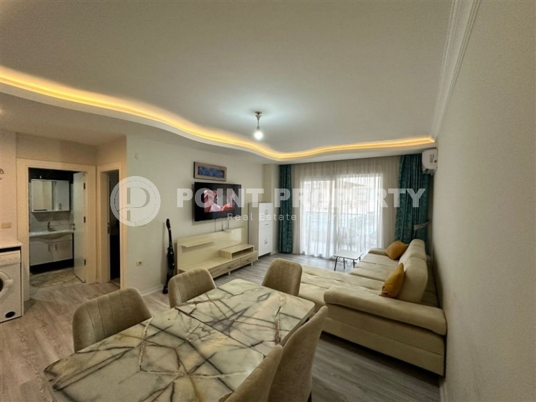 Просторная меблированная квартира 60 м² в Махмутларе-id-8716-фото-4