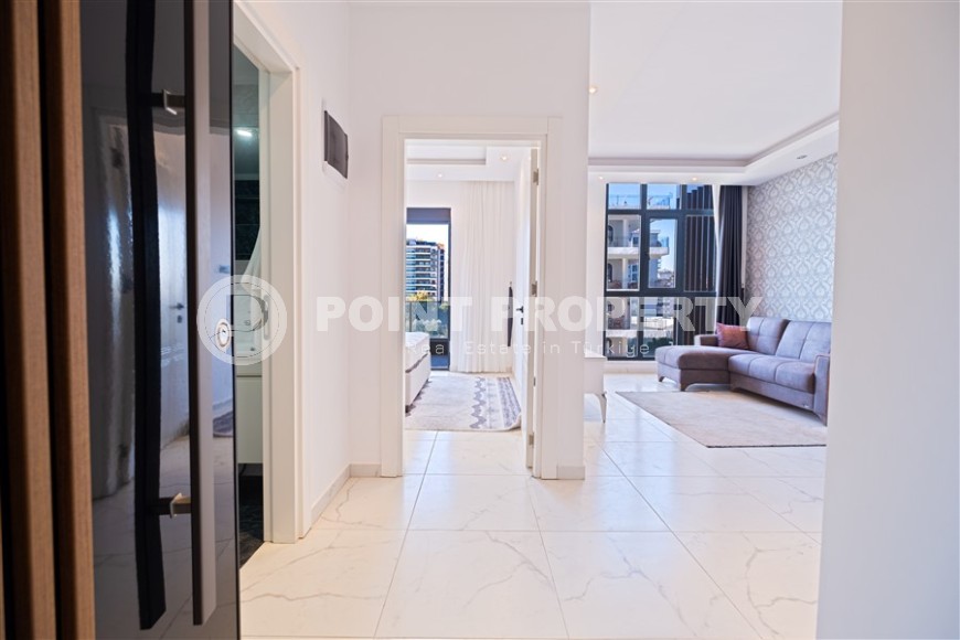 Новые апартаменты в Махмутларе — 1+1 квартира, 54 м²-id-8749-фото-2