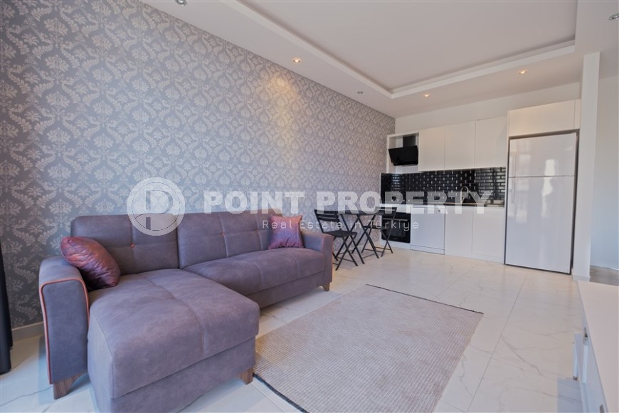 Новые апартаменты в Махмутларе — 1+1 квартира, 54 м²-id-8749-фото-4