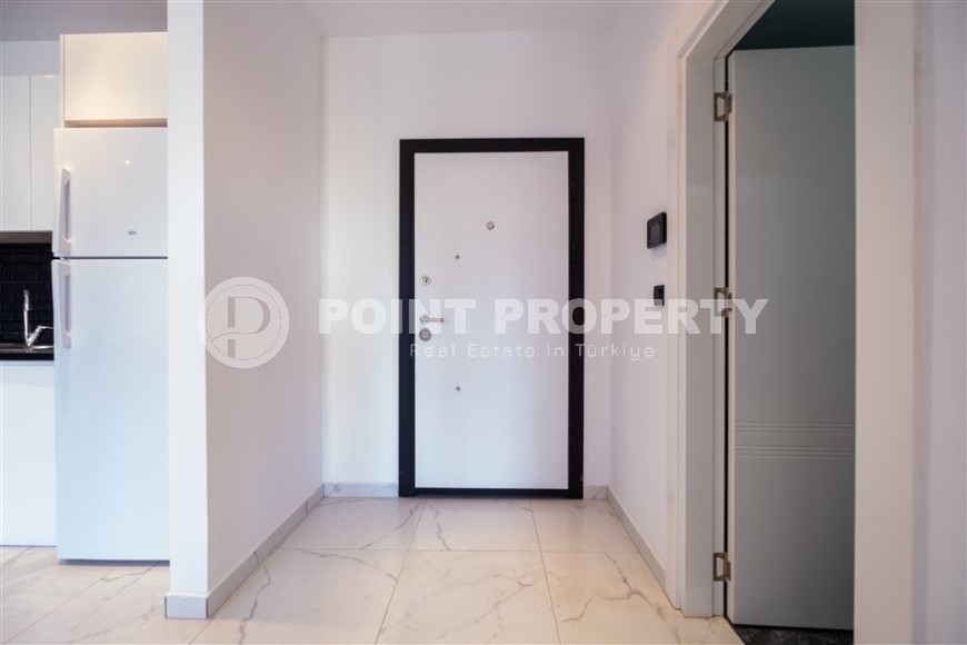 Новые апартаменты в Махмутларе — 1+1 квартира, 54 м²-id-8749-фото-7