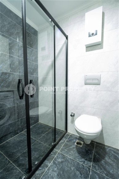 Новые апартаменты в Махмутларе — 1+1 квартира, 54 м²-id-8749-фото-9