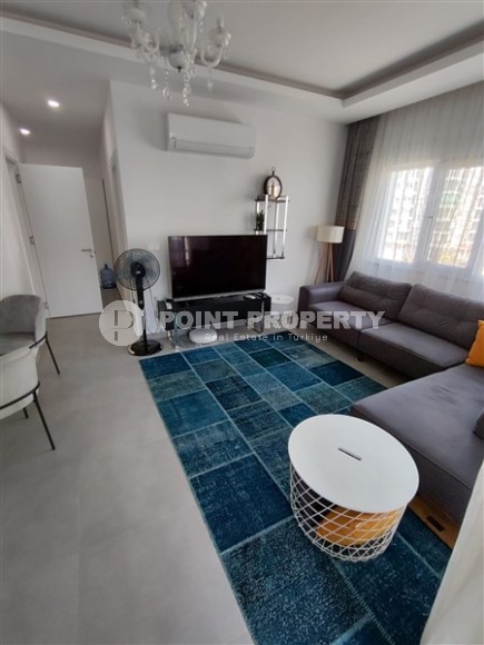 Современная квартира 55 м² с мебелью в Махмутларе-id-8766-фото-2