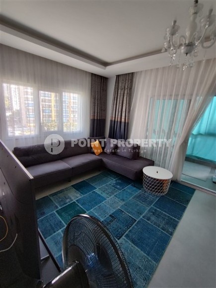 Современная квартира 55 м² с мебелью в Махмутларе-id-8766-фото-3