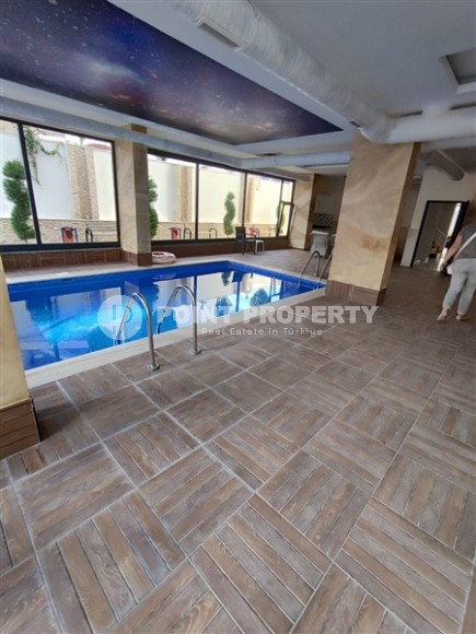 Современная квартира 55 м² с мебелью в Махмутларе-id-8766-фото-9