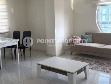 Просторная квартира 65 м² с застекленным балконом в Махмутларе, рядом с морем-id-8767-фото-2