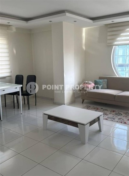 Просторная квартира 65 м² с застекленным балконом в Махмутларе, рядом с морем-id-8767-фото-2